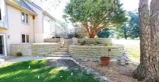 Limestone retaining walls with integrated stairs